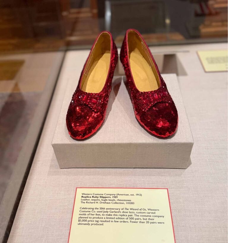 Replica ruby slippers from The Wizard of Oz exhibit at Chicago’s Driehaus Museum, symbolizing reinvention and iconic storytelling